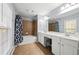 Elegant bathroom with double vanity, large mirror, and tile flooring at 3282 Victoria Sw Park, Atlanta, GA 30331