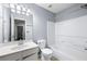 Simple bathroom with a white tub and vanity, perfect for guests at 3282 Victoria Sw Park, Atlanta, GA 30331