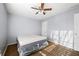 Spacious bedroom with plush mattress, ceiling fan, and ample natural light at 3282 Victoria Sw Park, Atlanta, GA 30331