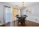 Dining room with dark wood table and chandelier at 3282 Victoria Sw Park, Atlanta, GA 30331