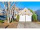 Two-story house with two-car garage and landscaped yard at 3282 Victoria Sw Park, Atlanta, GA 30331