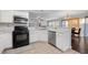 Modern kitchen with stainless steel appliances and white cabinets at 3282 Victoria Sw Park, Atlanta, GA 30331
