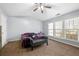 Large main bedroom with a king-size bed, ceiling fan, and large windows at 3282 Victoria Sw Park, Atlanta, GA 30331