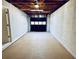 Unfinished basement garage with open space at 6076 Belle Meade Dr, Villa Rica, GA 30180