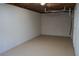 Unfinished basement with a concrete floor and block walls at 6076 Belle Meade Dr, Villa Rica, GA 30180