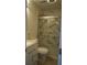 Updated bathroom with a modern vanity, shower, and toilet at 6076 Belle Meade Dr, Villa Rica, GA 30180