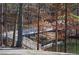 Elevated boardwalk path over water with railings at 6076 Belle Meade Dr, Villa Rica, GA 30180