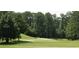 Landscaped golf course with lush green fairways at 6076 Belle Meade Dr, Villa Rica, GA 30180