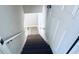 Modern stairs leading to lower level at 6076 Belle Meade Dr, Villa Rica, GA 30180