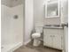 Clean bathroom with shower, toilet and granite vanity at 100 Spicewood Ct, South Fulton, GA 30349