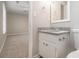 Simple bathroom with granite countertop, white vanity, and toilet at 100 Spicewood Ct, South Fulton, GA 30349