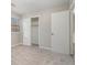 Bedroom with neutral walls, carpet flooring and a closet at 100 Spicewood Ct, South Fulton, GA 30349