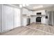 Modern kitchen with white cabinets and stainless steel appliances at 100 Spicewood Ct, South Fulton, GA 30349