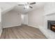 Living room with fireplace, hardwood floors, and neutral walls at 100 Spicewood Ct, South Fulton, GA 30349