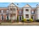 Brick townhouses with blue shutters, balconies, and well-maintained landscaping at 462 Carter Se Ave, Atlanta, GA 30317