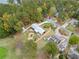 Aerial view showcasing house and surrounding neighborhood at 7312 Melrose Ct, Villa Rica, GA 30180