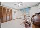 Home office with built-in wooden desk and chair at 7312 Melrose Ct, Villa Rica, GA 30180