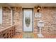 Brick front porch with decorative door and mailbox at 7312 Melrose Ct, Villa Rica, GA 30180