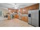 Updated kitchen with stainless steel appliances and wood cabinets at 7312 Melrose Ct, Villa Rica, GA 30180