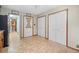 Laundry room with tiled floor, ample storage, and access to other areas at 7312 Melrose Ct, Villa Rica, GA 30180