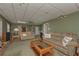 Finished basement with couches and a coffee table at 2192 Weslan Dr, Austell, GA 30106