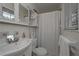 Clean bathroom with shower, white tile and vanity at 2192 Weslan Dr, Austell, GA 30106