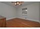 Spacious bedroom with hardwood floors and ceiling fan at 2192 Weslan Dr, Austell, GA 30106