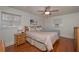 Bedroom with hardwood floors, ceiling fan, and neutral decor at 2192 Weslan Dr, Austell, GA 30106