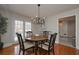 Bright dining room with built-in cabinetry and hardwood floors at 2192 Weslan Dr, Austell, GA 30106