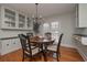 Elegant dining room featuring a round table and hardwood floors at 2192 Weslan Dr, Austell, GA 30106