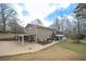 Brick house with carport, large backyard, and deck at 2192 Weslan Dr, Austell, GA 30106
