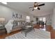 Hardwood floor living room with a view into the dining area at 2192 Weslan Dr, Austell, GA 30106