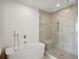 Bathroom with soaking tub and walk-in shower at 2425 Peachtree Ne Rd # 1106, Atlanta, GA 30305
