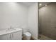Clean bathroom with white vanity, toilet and a walk-in shower at 2425 Peachtree Ne Rd # 1106, Atlanta, GA 30305