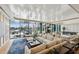 Spacious community room with sectional sofa and large windows overlooking the patio at 2425 Peachtree Ne Rd # 1106, Atlanta, GA 30305
