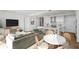 Open concept dining area with kitchen and living room views at 2425 Peachtree Ne Rd # 1106, Atlanta, GA 30305