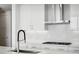 Modern kitchen with stainless steel appliances and white shaker cabinets at 2425 Peachtree Ne Rd # 1106, Atlanta, GA 30305