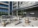 Outdoor lounge area with fire pit and comfortable seating at 2425 Peachtree Ne Rd # 1106, Atlanta, GA 30305
