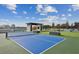 Relaxing rooftop patio with a pickleball court and city views at 2425 Peachtree Ne Rd # 1106, Atlanta, GA 30305