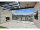 Modern rooftop deck with fireplace, TV, and city views at 2425 Peachtree Ne Rd # 1106, Atlanta, GA 30305