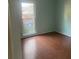 Bedroom with hardwood floors and a window at 3262 Carriage Way, Marietta, GA 30062