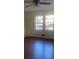 Bedroom with hardwood floors and ceiling fan at 3262 Carriage Way, Marietta, GA 30062