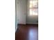 Bedroom with hardwood floors and a window at 3262 Carriage Way, Marietta, GA 30062