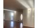 Bright entryway with hardwood floors and an oval window at 3262 Carriage Way, Marietta, GA 30062