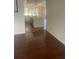 Kitchen with island and hardwood floors, view from living room at 3262 Carriage Way, Marietta, GA 30062