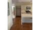Island kitchen with white cabinets and terracotta tile floors at 3262 Carriage Way, Marietta, GA 30062