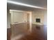 Bright living room with hardwood floors and fireplace at 3262 Carriage Way, Marietta, GA 30062