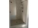 Large tiled shower with multiple shower heads at 3262 Carriage Way, Marietta, GA 30062