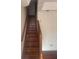 Elegant wooden staircase leading to upper level at 3262 Carriage Way, Marietta, GA 30062