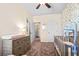 Bedroom featuring a crib and dresser with neutral decor at 304 Skye Ln # 69, Cartersville, GA 30121